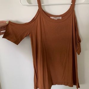 Orange top with shoulder slits